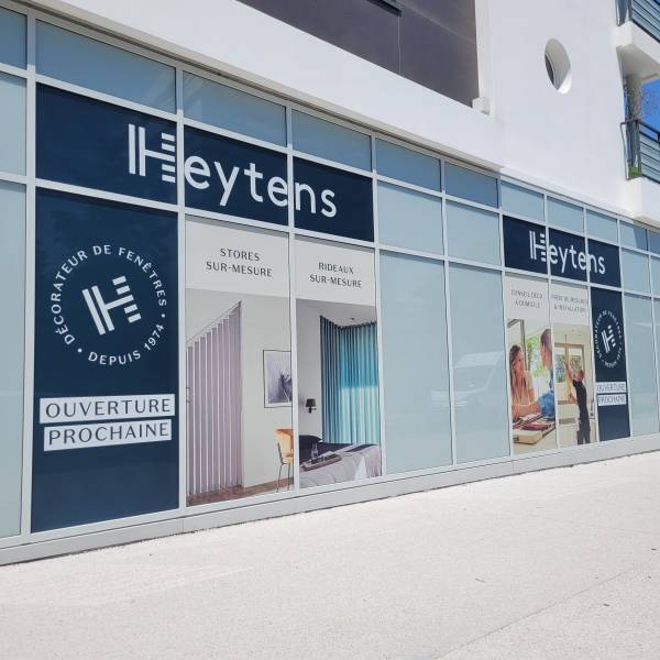 Habillage vitrines en adhésifs microperforés sur magasin HEYTENS à ANGLET