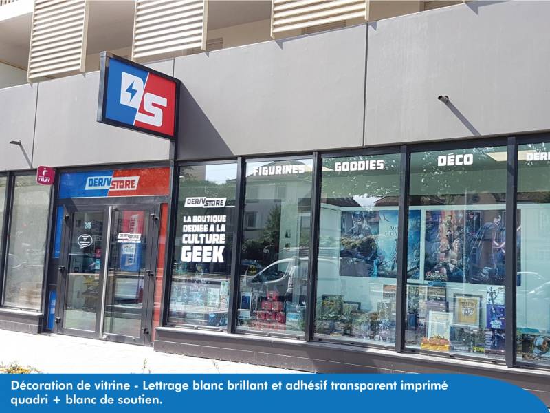 Habillage de vitrine de magasin avec lettrage blanc à Strasbourg en Alsace